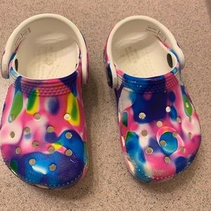 Crocs- Toddler girl size 6.  Gently used.  Like new.   Multi-color-tyedye